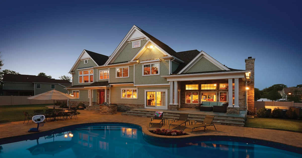 House with siding at night